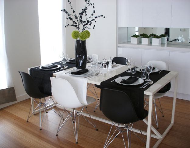 Dining Black and white dining with Eames chairs