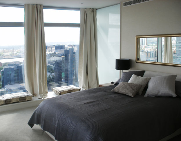 Master bedroom with neutral textiles